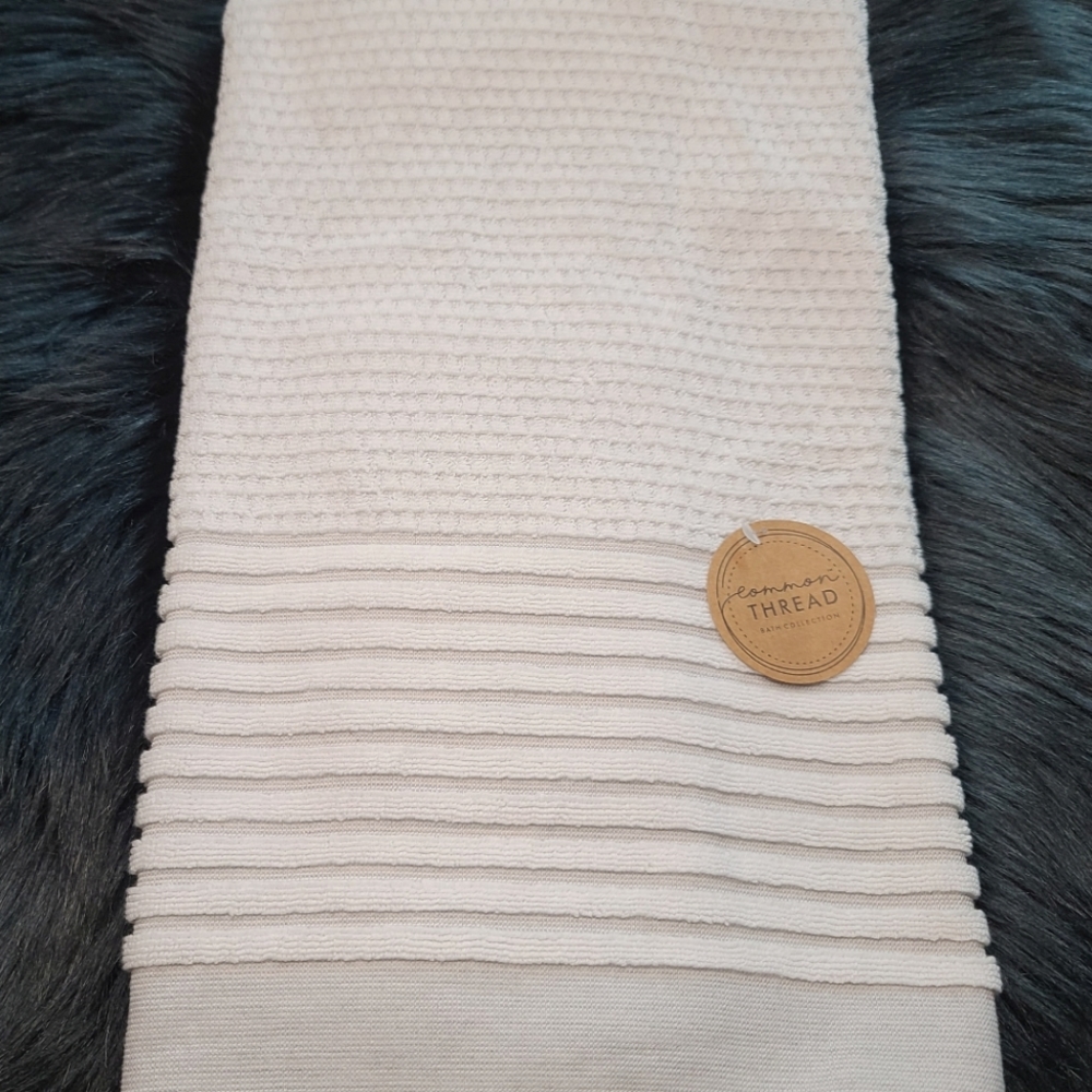 Grey and white bath towels